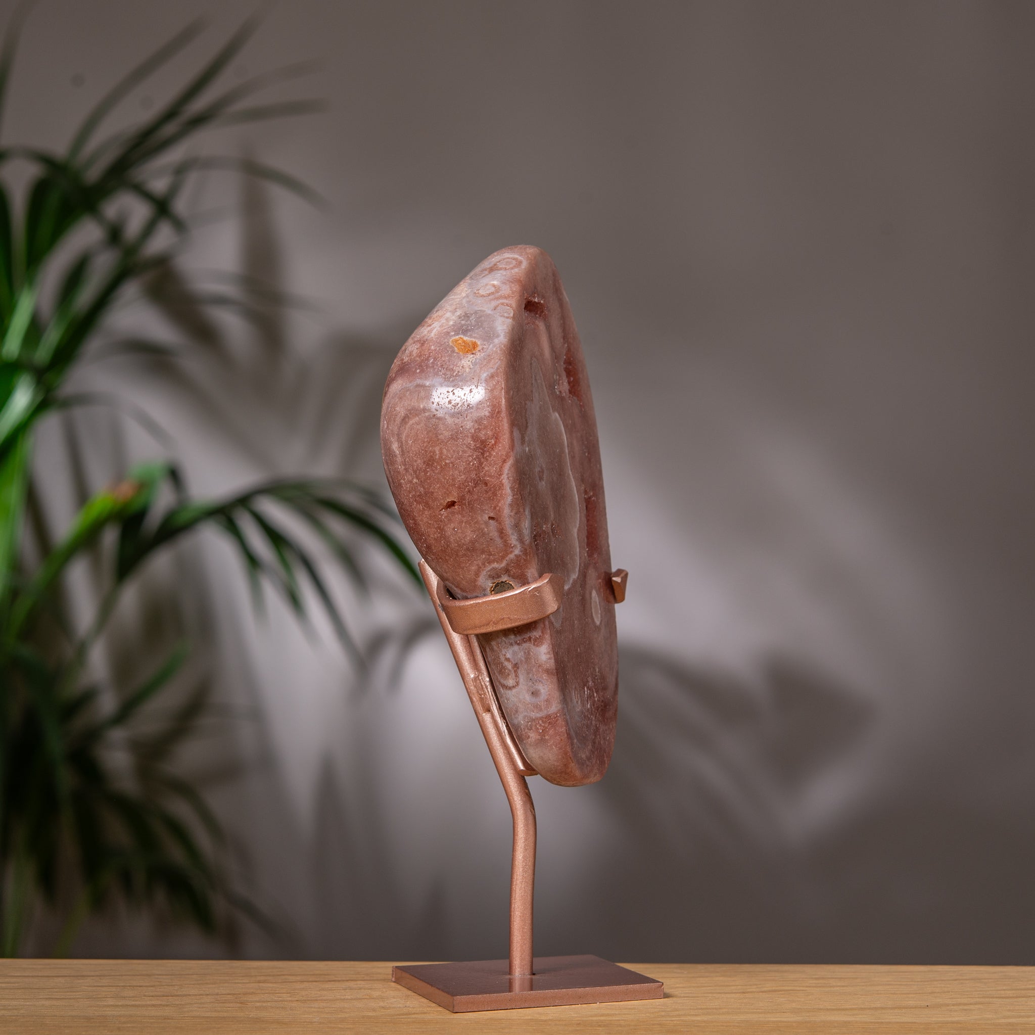 Pink Amethyst Slab in Terracotta Red on Stand