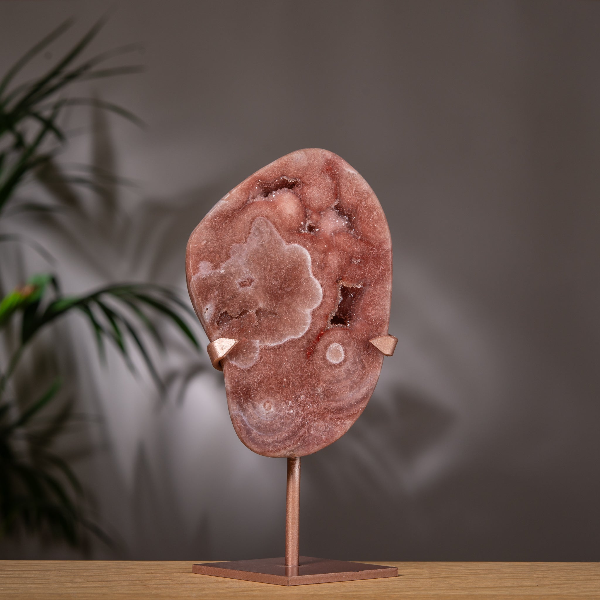 Pink Amethyst Slab in Terracotta Red on Stand